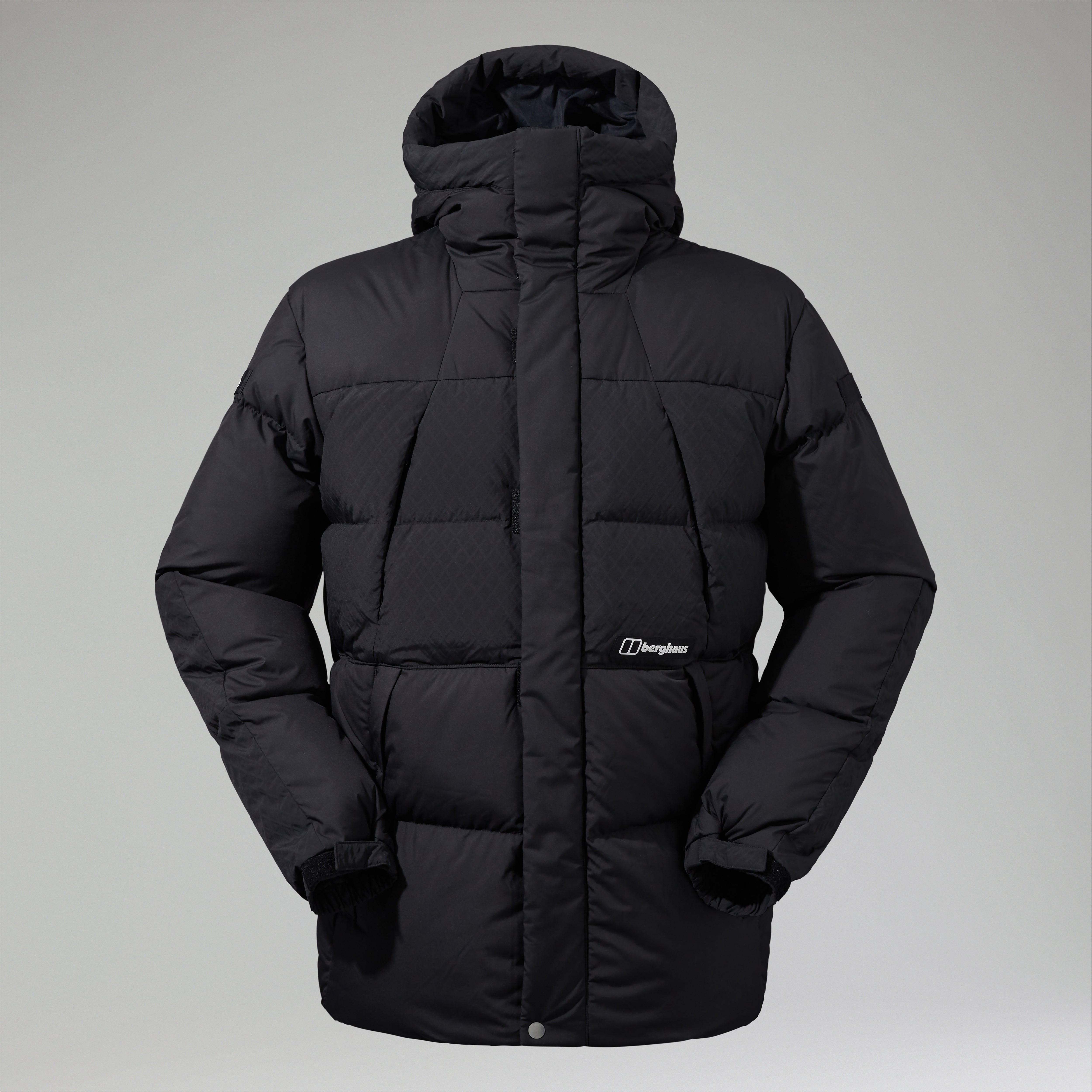 A black baffled down jacket with a stand collar, shown from the front.