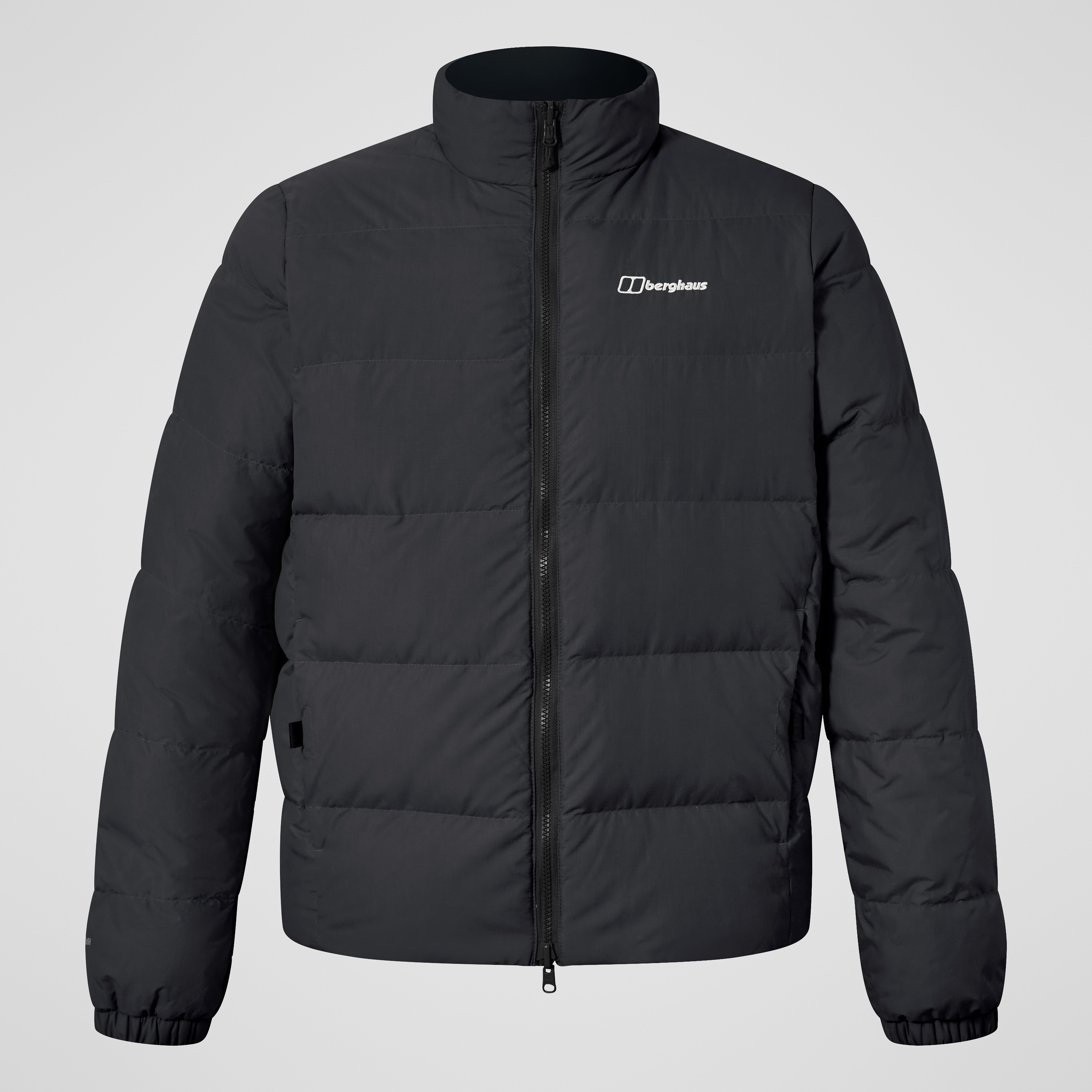 A black reversible down jacket, shown with the ripstop face outwards in a boxy fit.